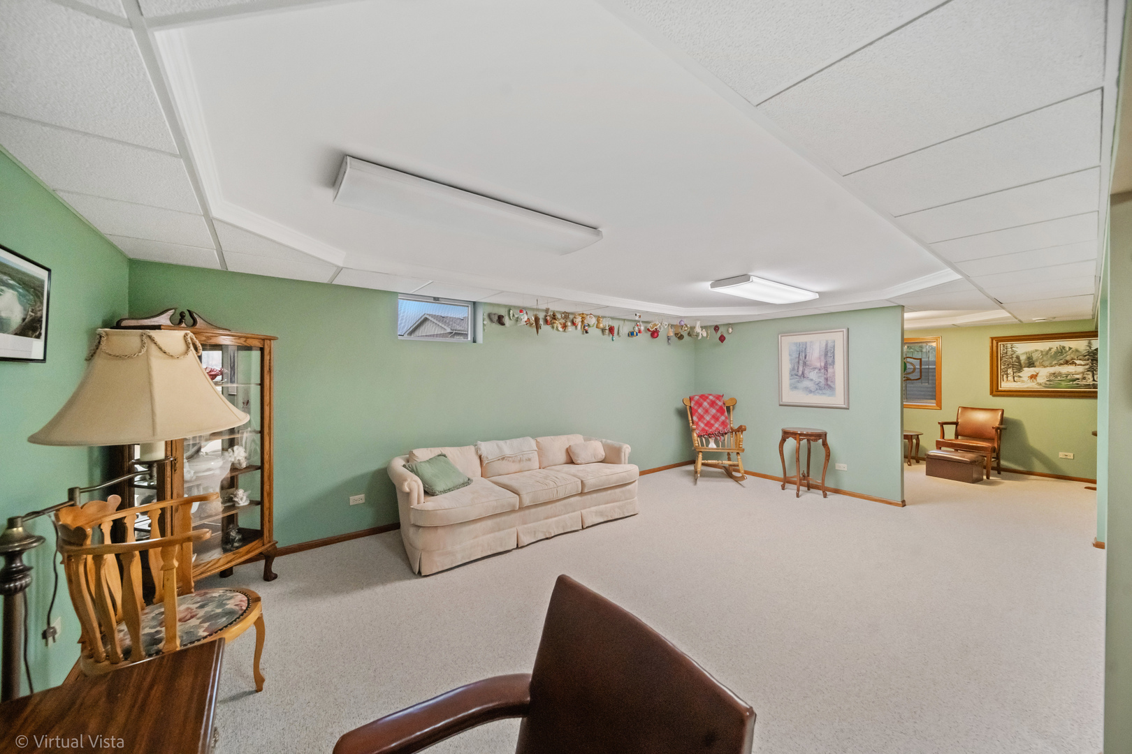 1262 Rutgers Drive Woodridge, IL 60517 - Photo 17 of 22 a living room with furniture and a flat screen tv
