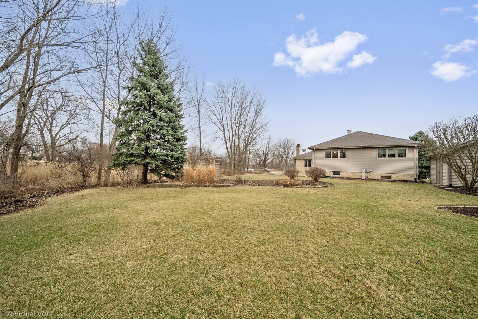 1262 Rutgers Drive Woodridge, IL 60517 - Photo 21 of 22 a front view of house with yard and trees