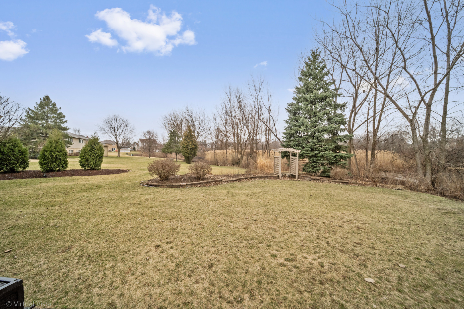 1262 Rutgers Drive Woodridge, IL 60517 - Photo 22 of 22 a backyard of a house with lots of green space
