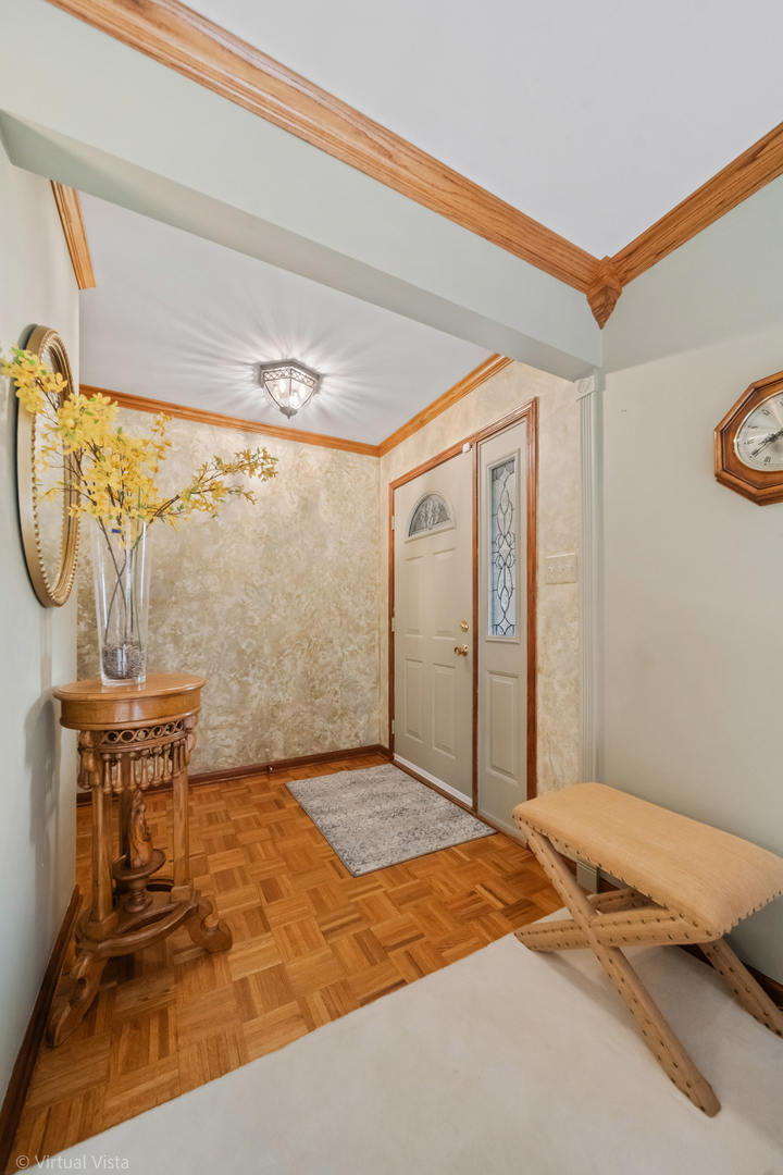 1262 Rutgers Drive Woodridge, IL 60517 - Photo 3 of 22 a bedroom with a bed a mirror and a window