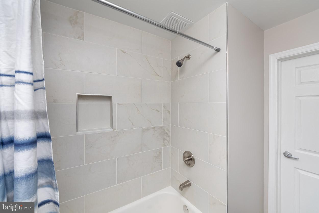 3106 Northwind Road Baltimore, MD 21234 - Photo 25 of 36 Full Bath with custom ceramic tile.