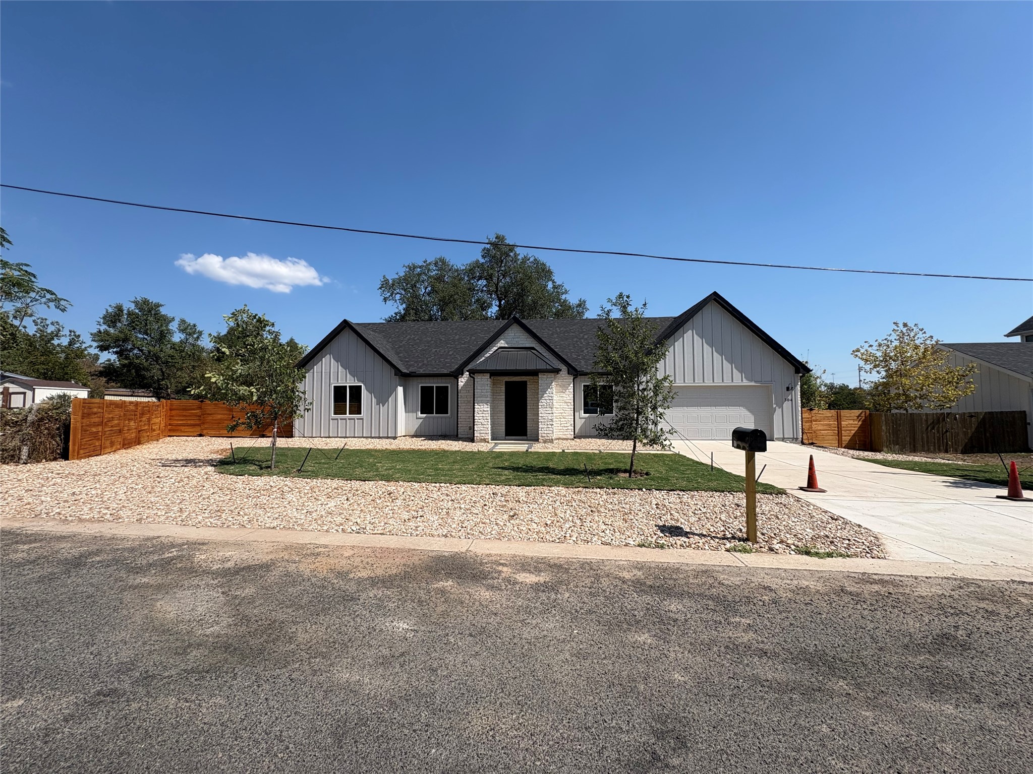 a view of house with a street