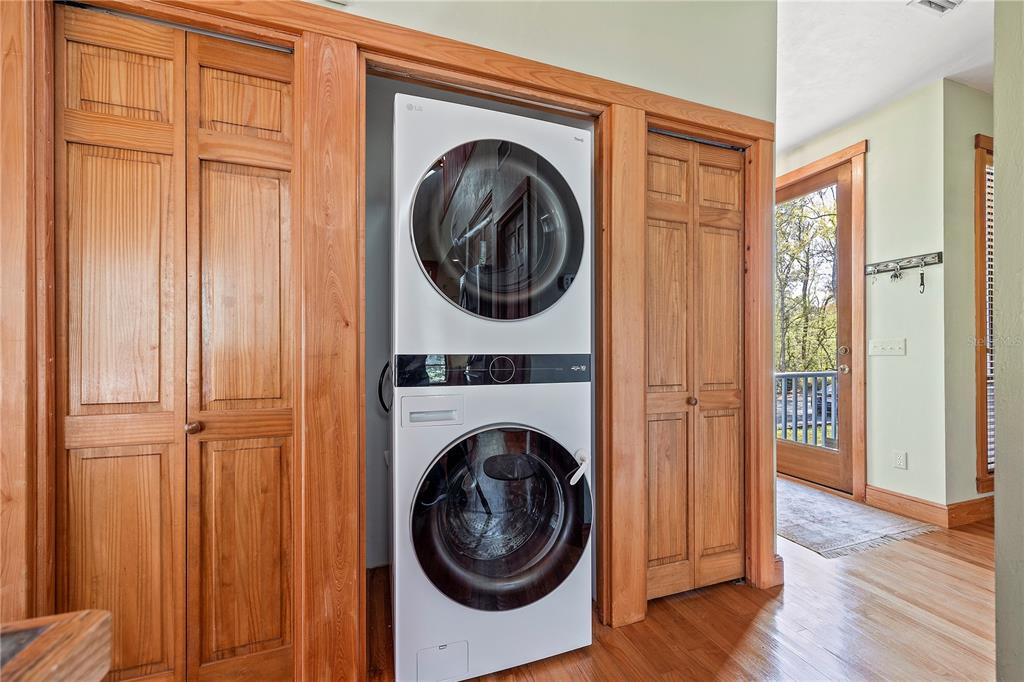 1376 Southwest Riverside Avenue Fort White, FL 32038 - Photo 15 of 40 a view of a bedroom with washer and dryer