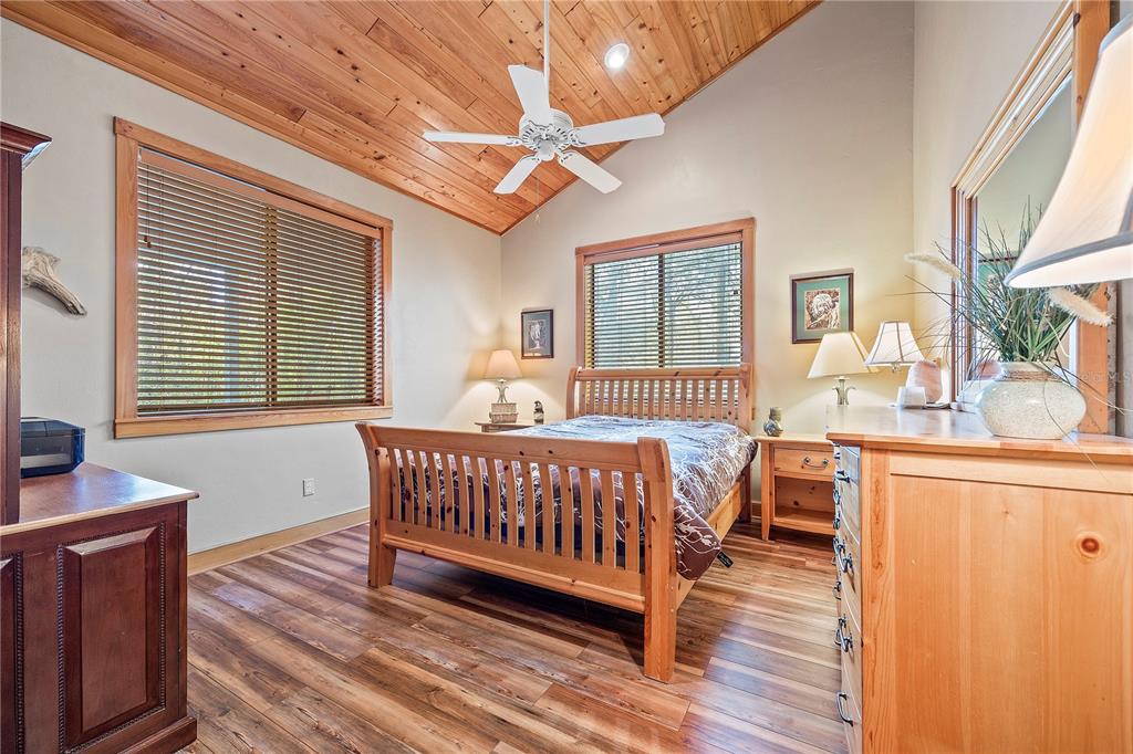 1376 Southwest Riverside Avenue Fort White, FL 32038 - Photo 16 of 40 a bedroom with furniture and windows