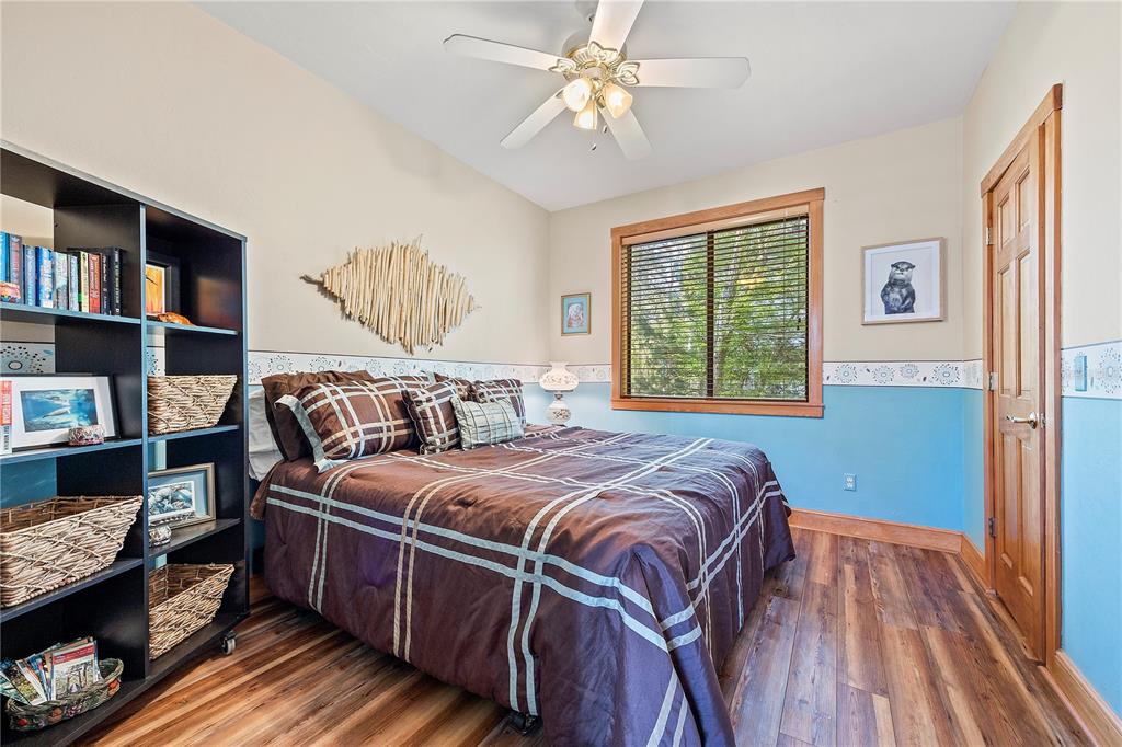 1376 Southwest Riverside Avenue Fort White, FL 32038 - Photo 19 of 40 a bedroom with a bed furniture and a window