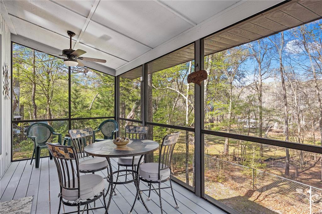 1376 Southwest Riverside Avenue Fort White, FL 32038 - Photo 24 of 40 a view of a dining room with furniture window and outside view