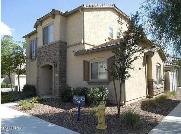 a front view of house with yard