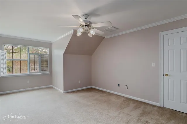 a spacious bathroom with a sink double vanity and a mirror