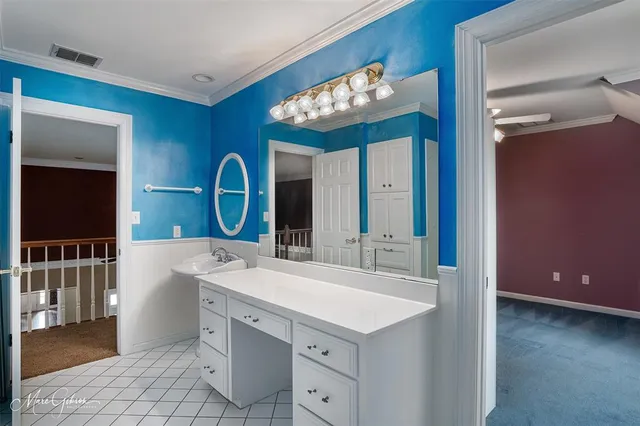 a bathroom with a toilet a sink and bathtub