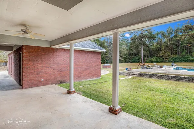 a view of pool and outdoor space