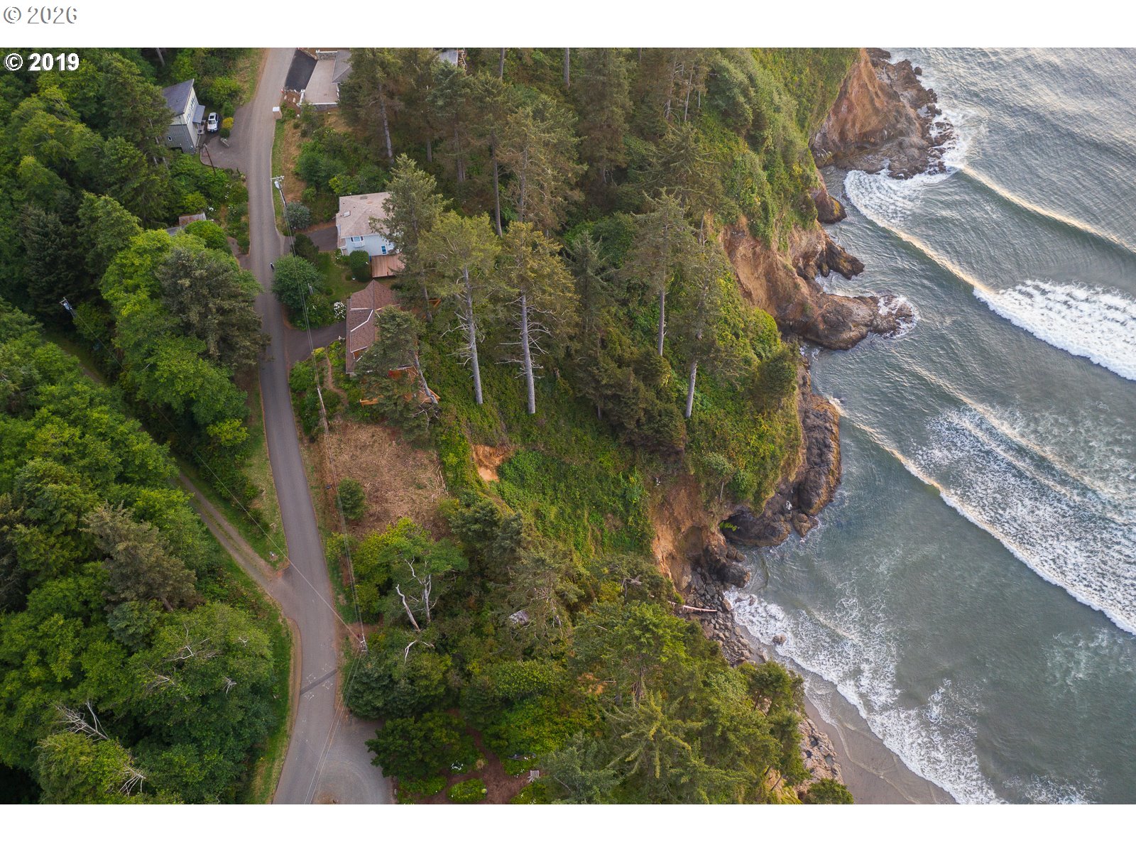 South Beach Road Neskowin, OR 97149 - Photo 10 of 12 a view of a house with a yard