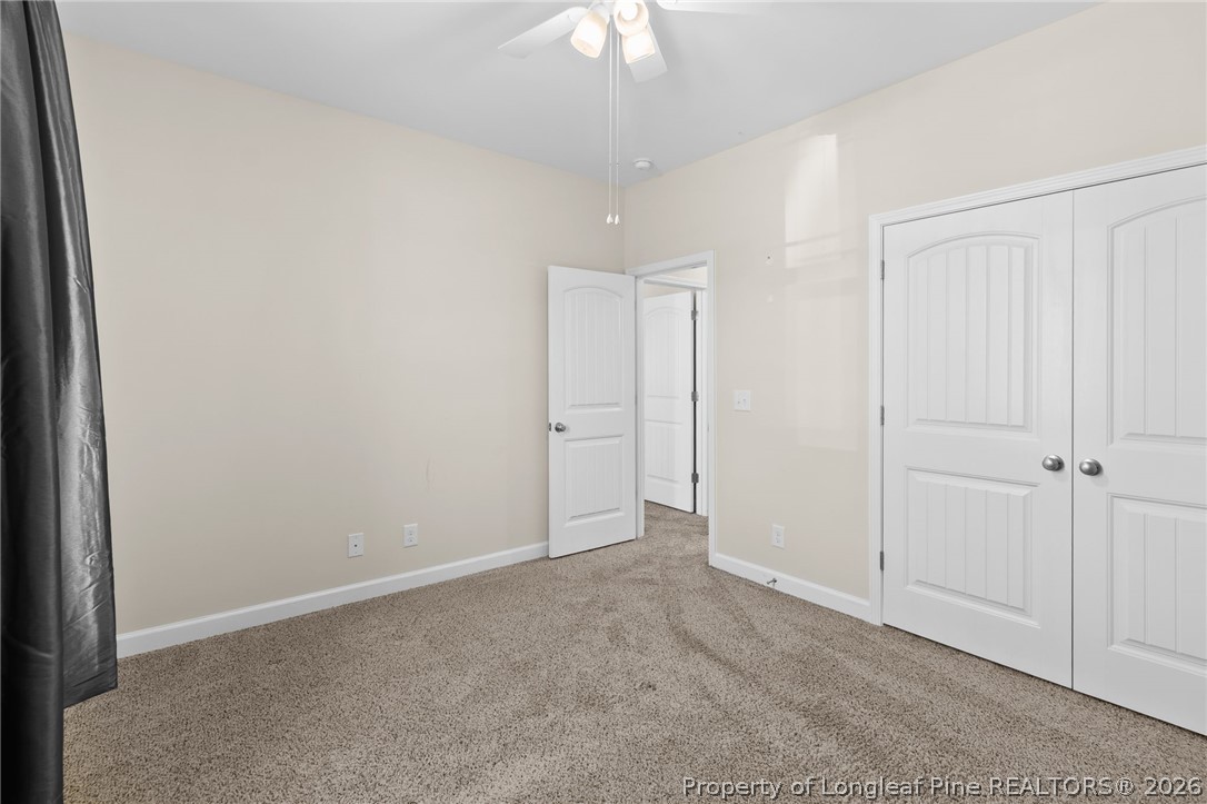 216 Meherrin Loop Raeford, NC 28376 - Photo 28 of 38 a view of an empty room and chandelier fan
