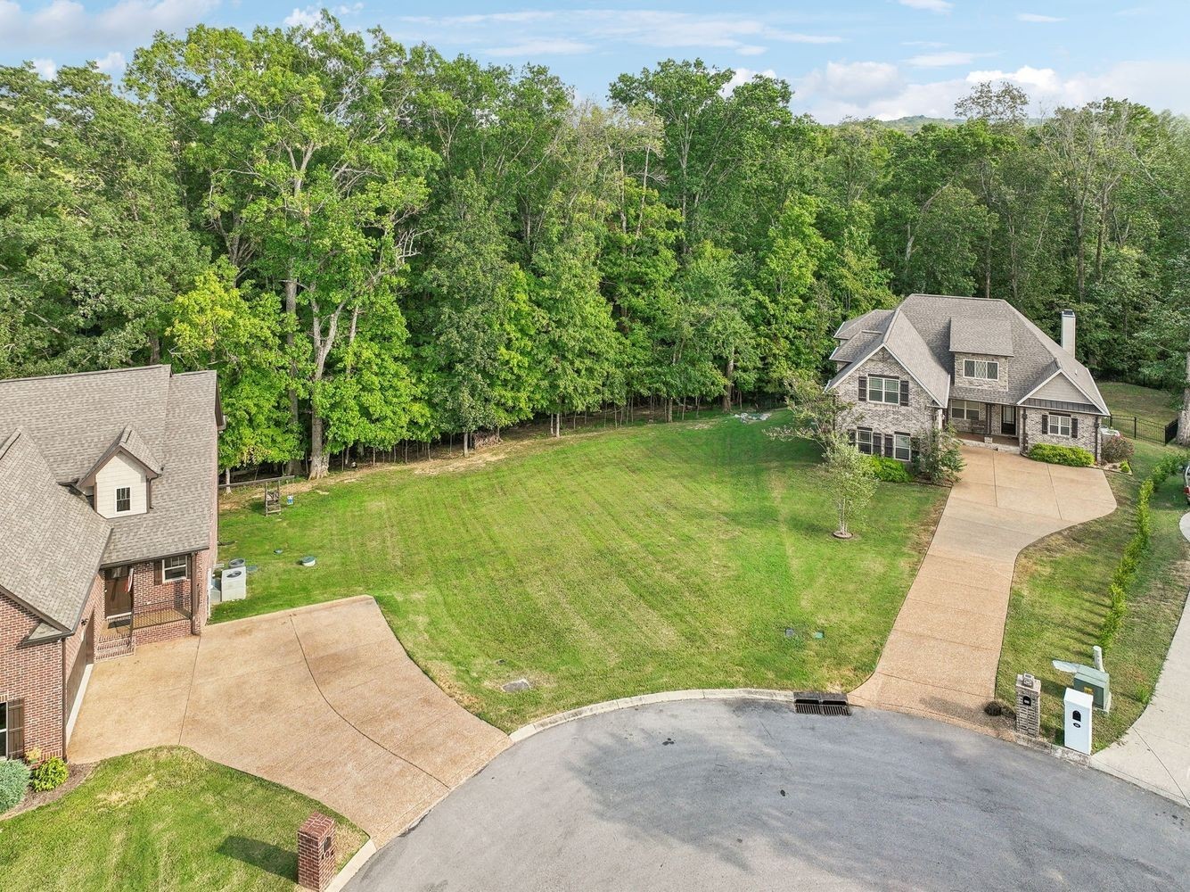 402 Zephyr Cove Lebanon, TN 37087 - Photo 5 of 27 an aerial view of a house with swimming pool garden and patio