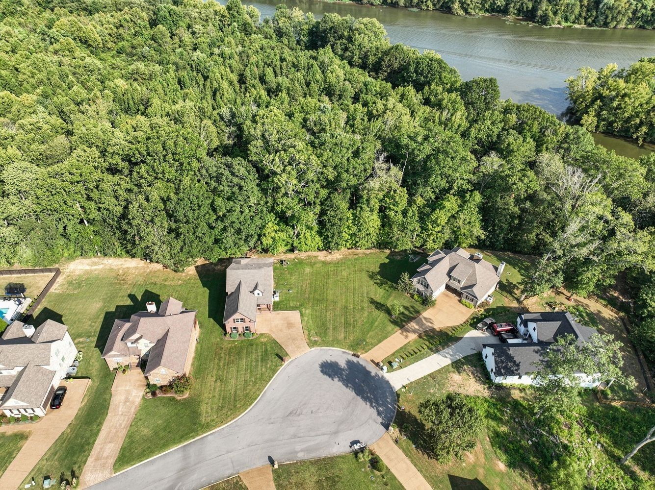 402 Zephyr Cove Lebanon, TN 37087 - Photo 7 of 27 an aerial view of a house with outdoor space and lake view