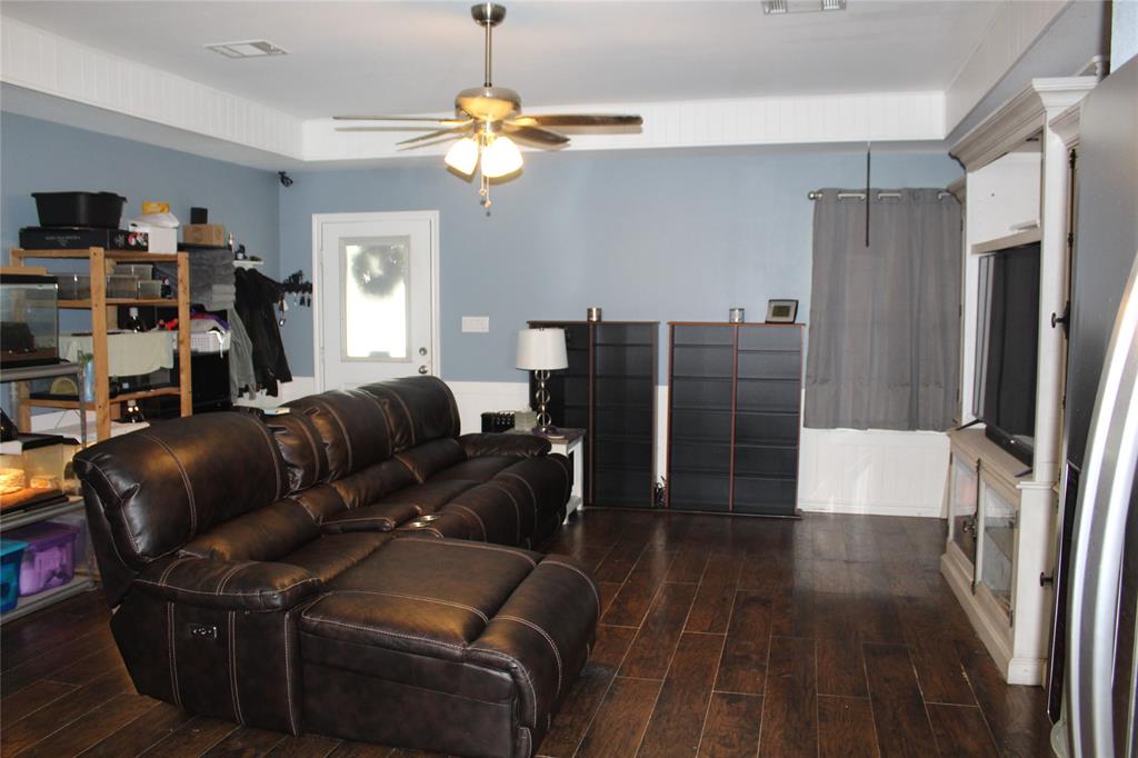 402 Cleveland Street Bailey, TX 75452 - Photo 3 of 17 Living area with wood-type flooring and a ceiling fan