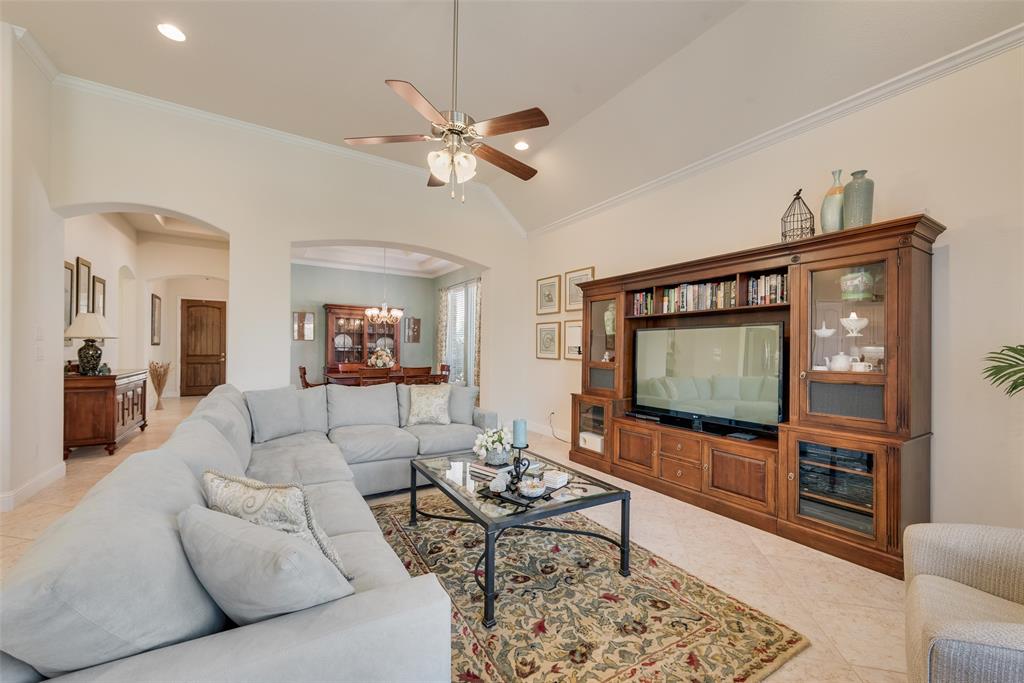 14026 Gutierrez Road Frisco, TX 75035 - Photo 11 of 36 a living room with furniture and a flat screen tv