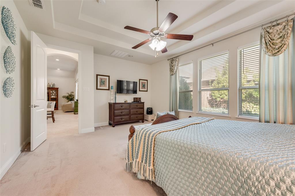 14026 Gutierrez Road Frisco, TX 75035 - Photo 15 of 36 a spacious bedroom with a bed and ceiling fan