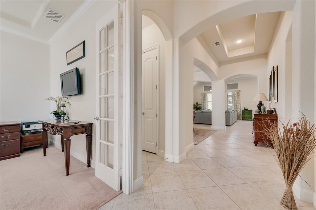 14026 Gutierrez Road Frisco, TX 75035 - Photo 19 of 36 a view of a livingroom with a flat screen tv