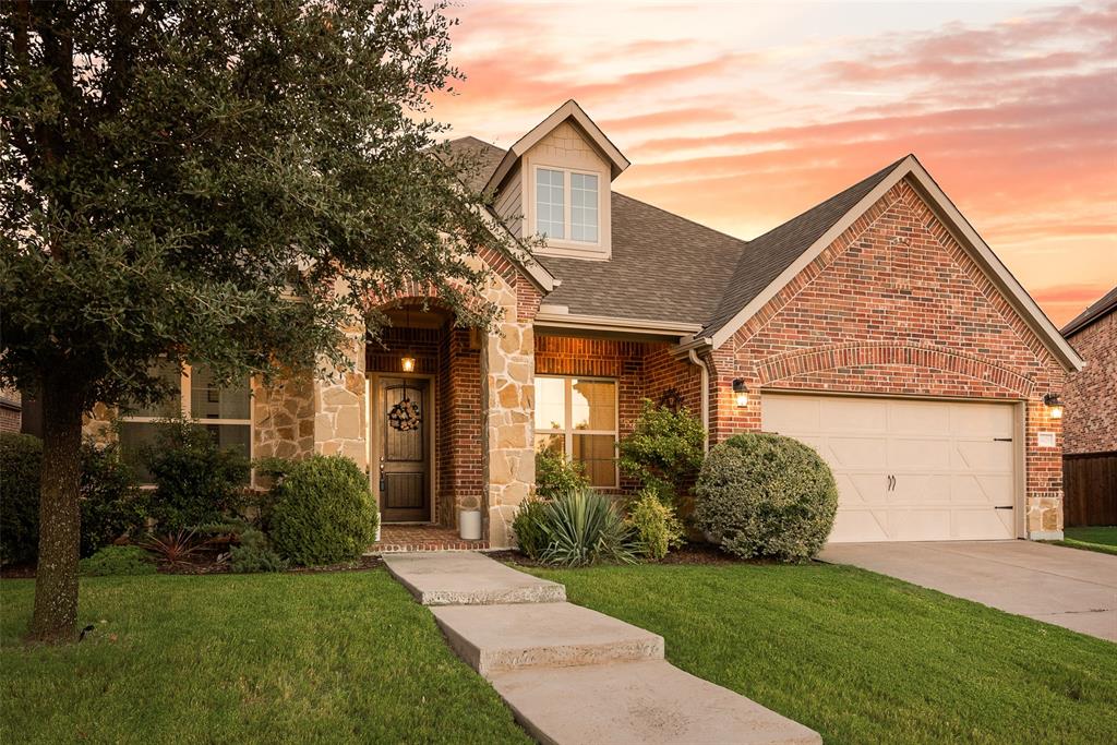 14026 Gutierrez Road Frisco, TX 75035 - Photo 30 of 36 a front view of a house with a yard