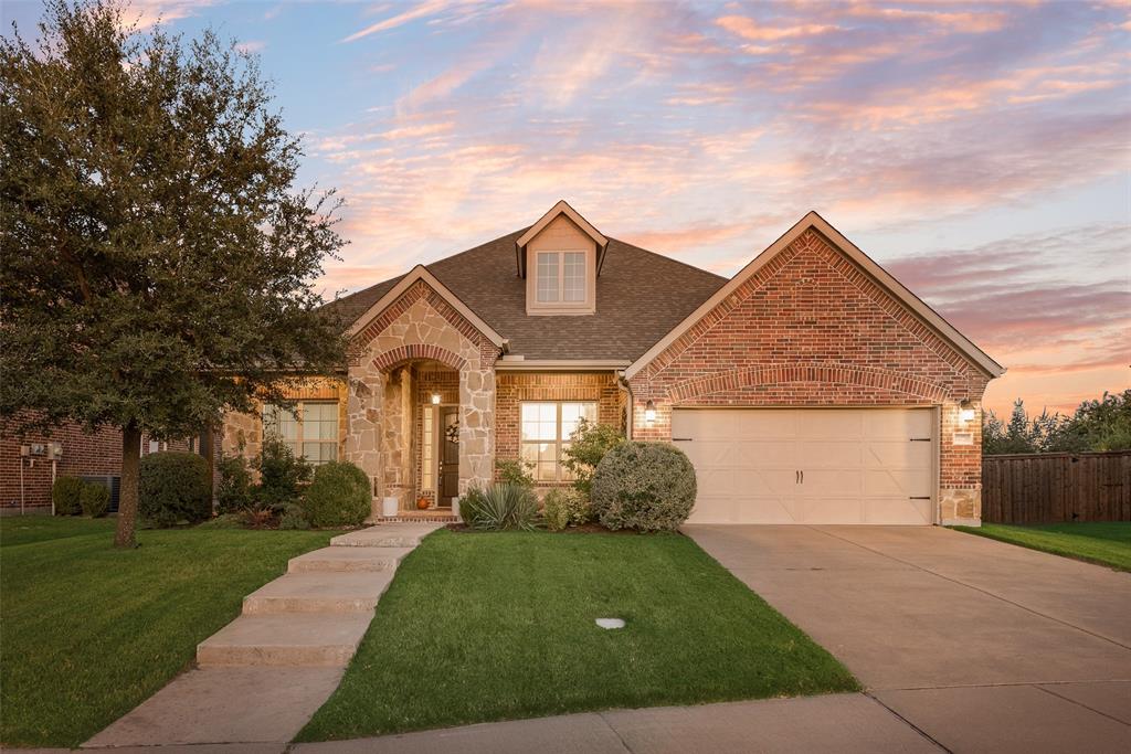 14026 Gutierrez Road Frisco, TX 75035 - Photo 31 of 36 a front view of a house with a yard