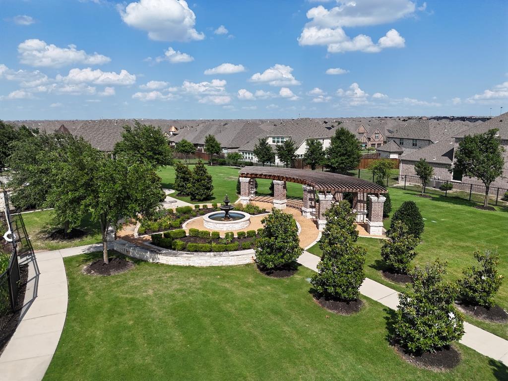 14026 Gutierrez Road Frisco, TX 75035 - Photo 33 of 36 a view of a garden with lawn chairs