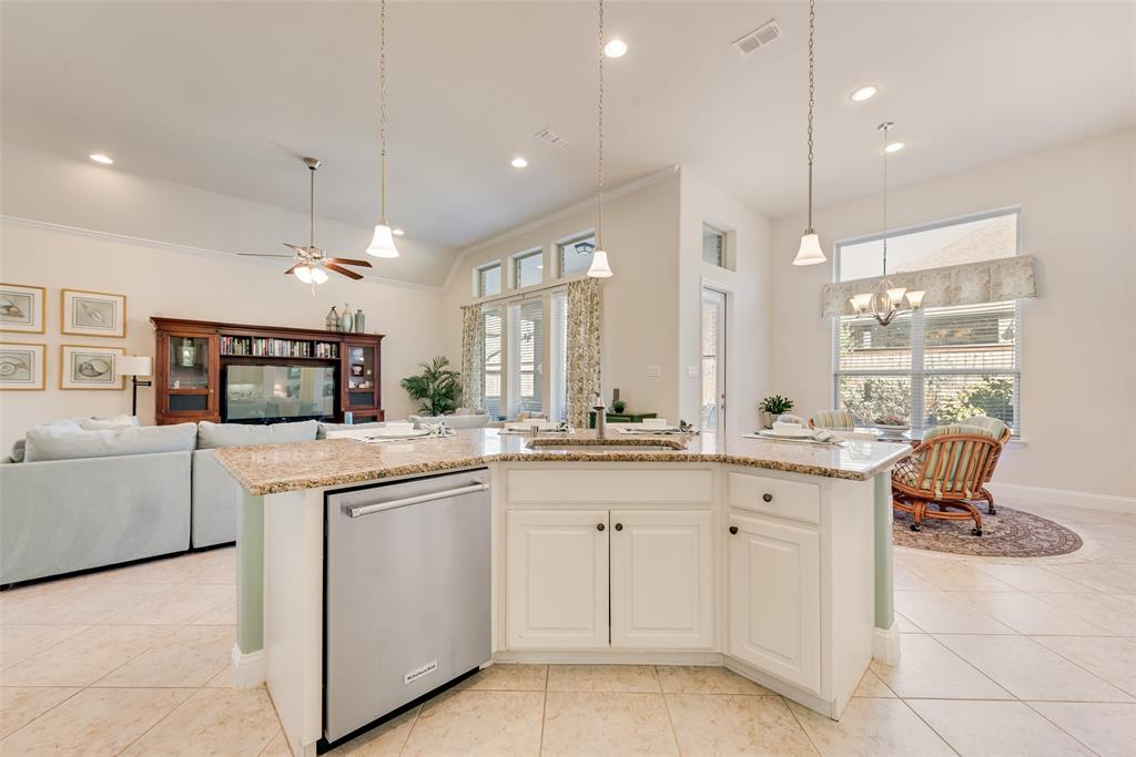 14026 Gutierrez Road Frisco, TX 75035 - Photo 35 of 36 a kitchen with white cabinets and sink