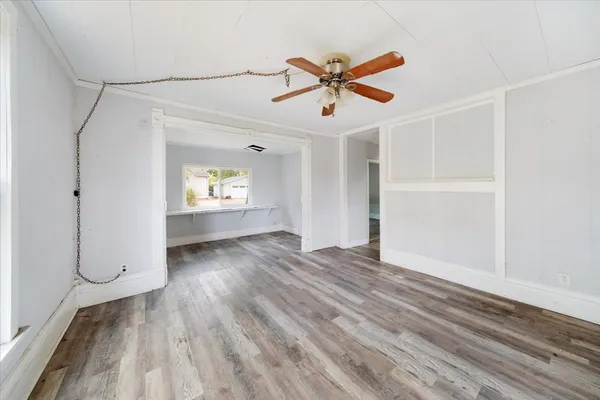 a view of an empty room and window