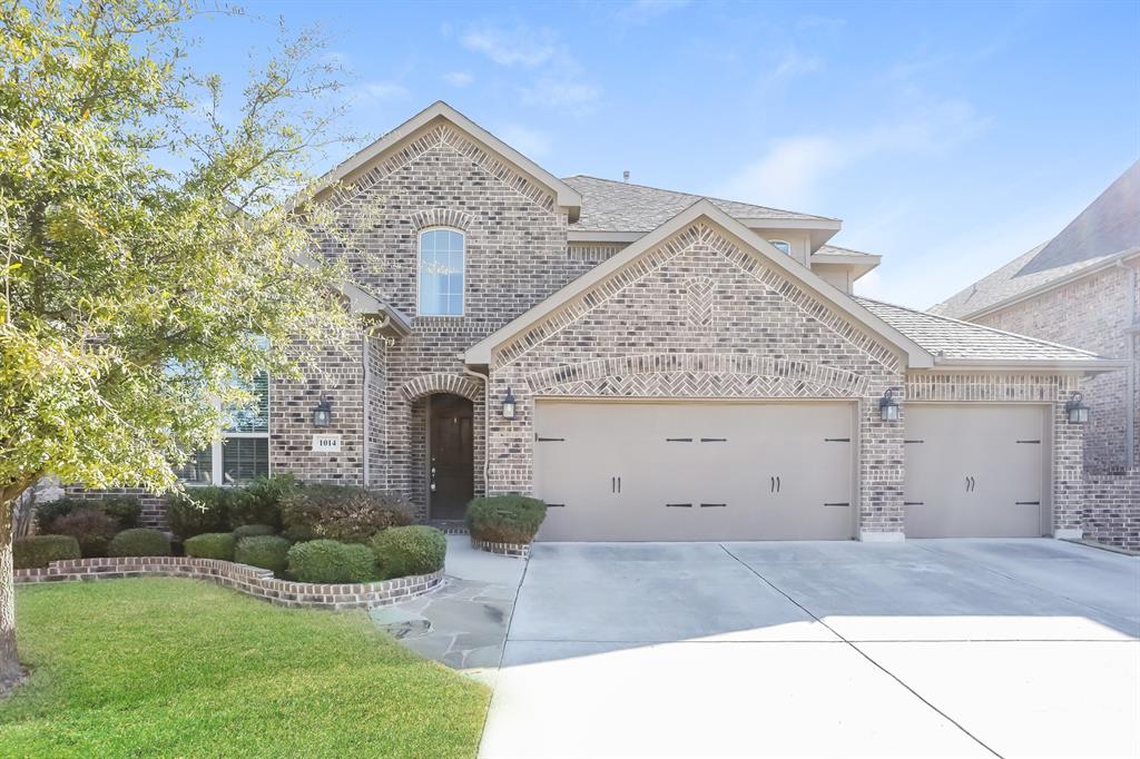 1014 Longhill Way Forney, TX 75126 - Photo 1 of 15 a view of a house with a yard