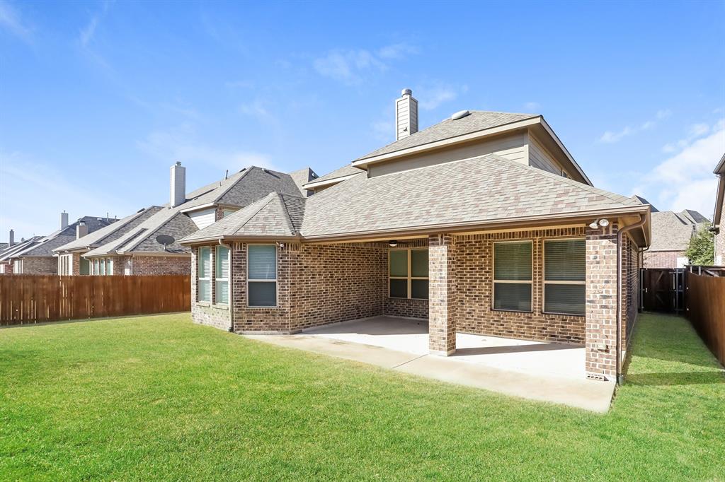 1014 Longhill Way Forney, TX 75126 - Photo 15 of 15 front view of a house with a yard