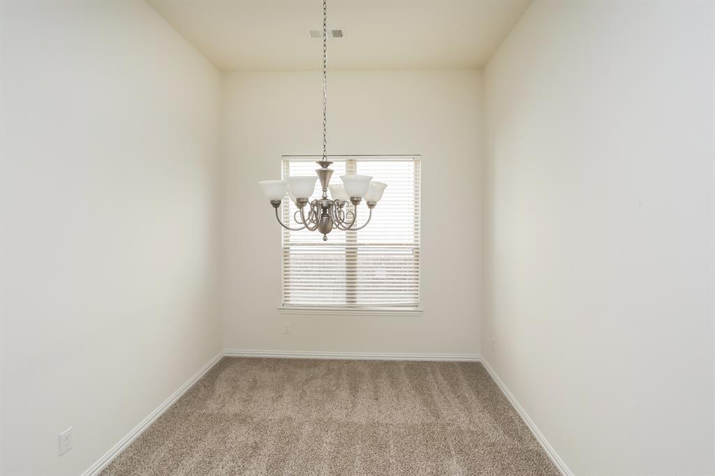 1014 Longhill Way Forney, TX 75126 - Photo 4 of 15 a view of an empty room with a window