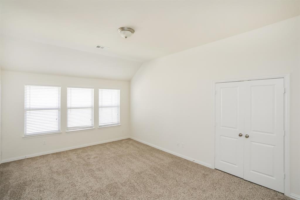 1014 Longhill Way Forney, TX 75126 - Photo 9 of 15 an empty room with windows