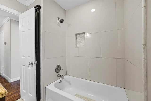 a bathroom with a bathtub
