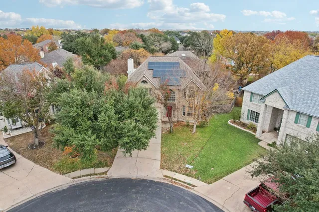 a view of a yard with trees