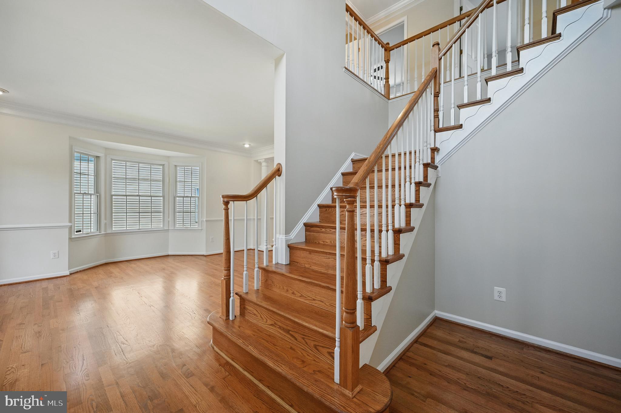 10861 Hunter Gate Way Reston, VA 20194 - Photo 25 of 79 a view of entryway with wooden floor and stairs