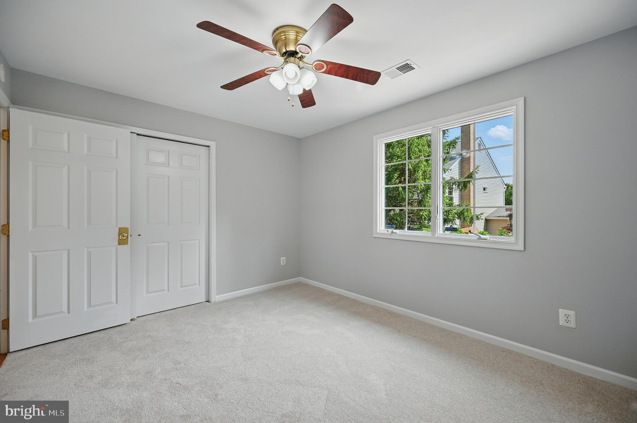 10861 Hunter Gate Way Reston, VA 20194 - Photo 40 of 79 an empty room with windows and fan