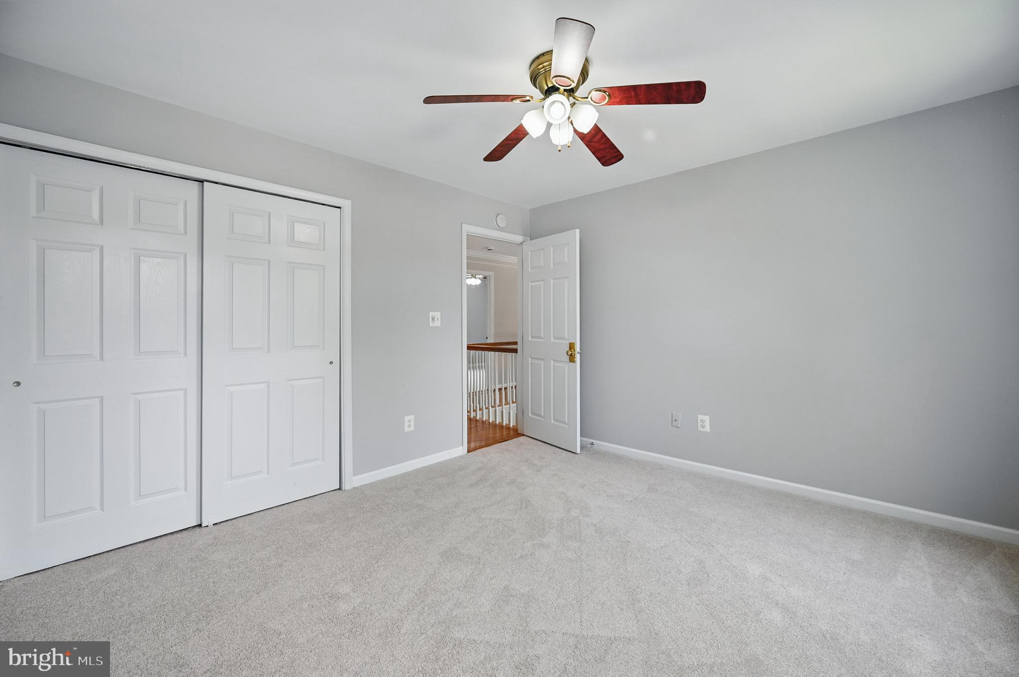 10861 Hunter Gate Way Reston, VA 20194 - Photo 46 of 79 a view of an empty room with a fan