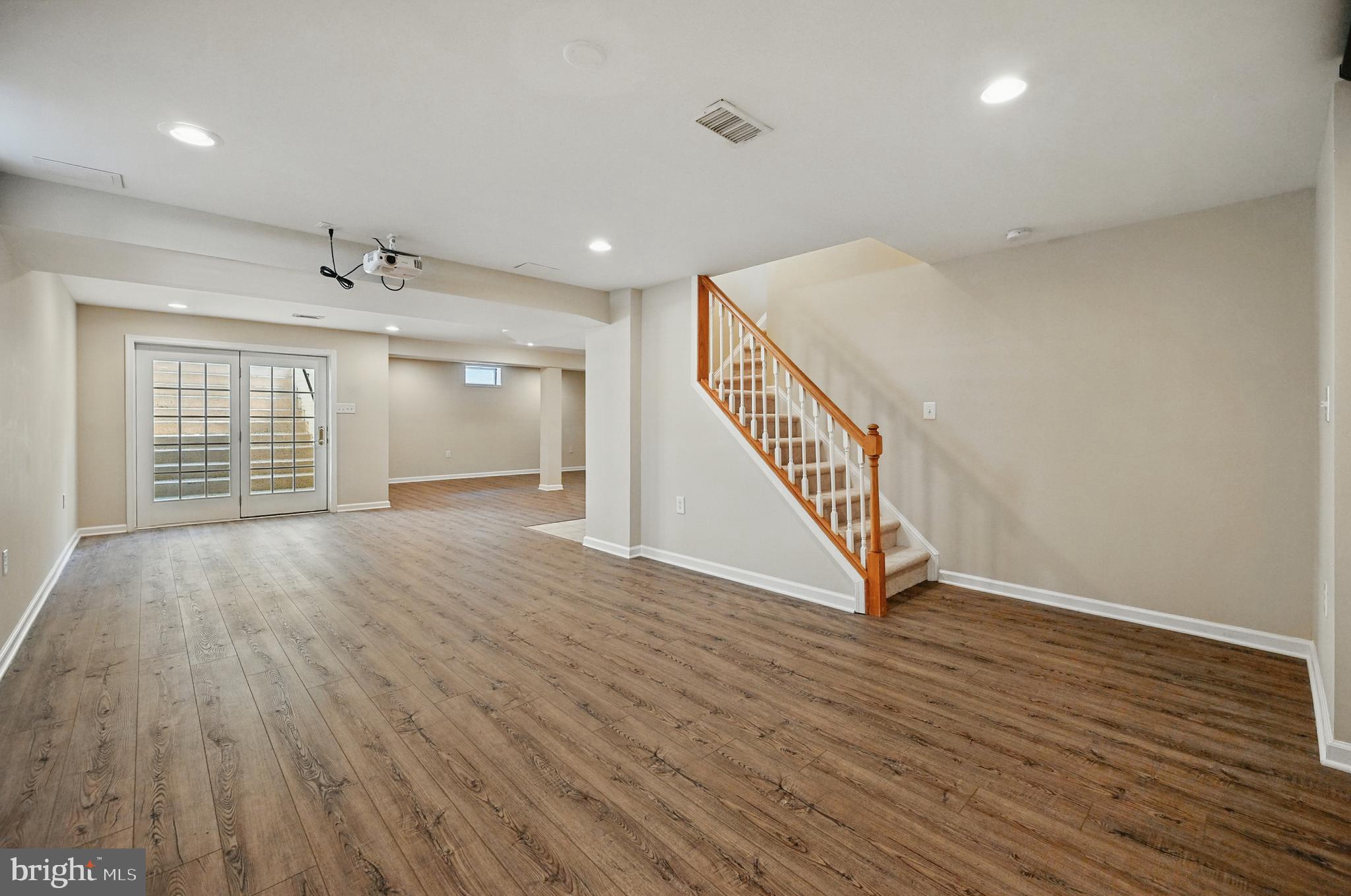 10861 Hunter Gate Way Reston, VA 20194 - Photo 48 of 79 a view of an empty room with wooden floor and a window