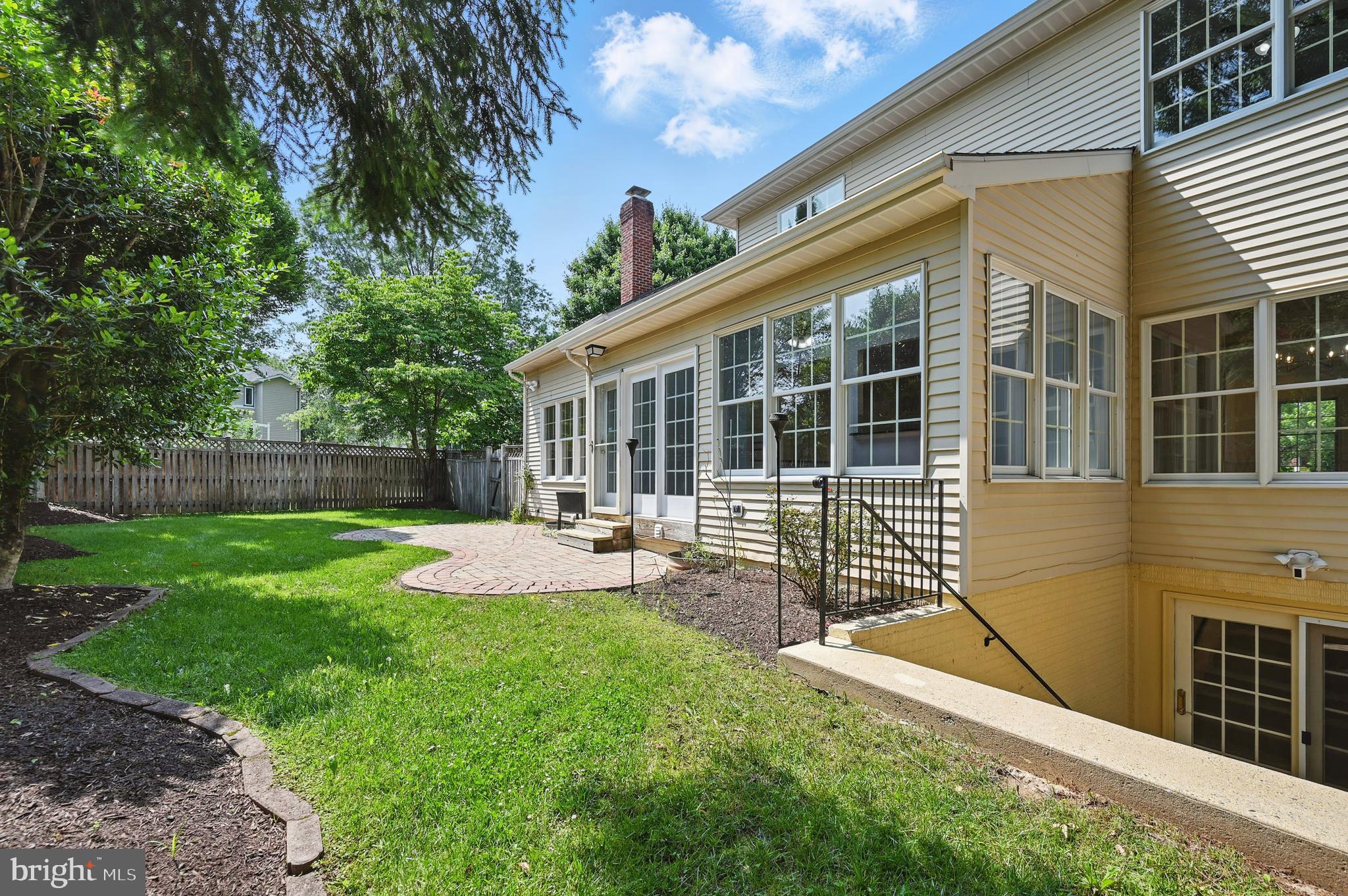 10861 Hunter Gate Way Reston, VA 20194 - Photo 62 of 79 front view of a house with a yard