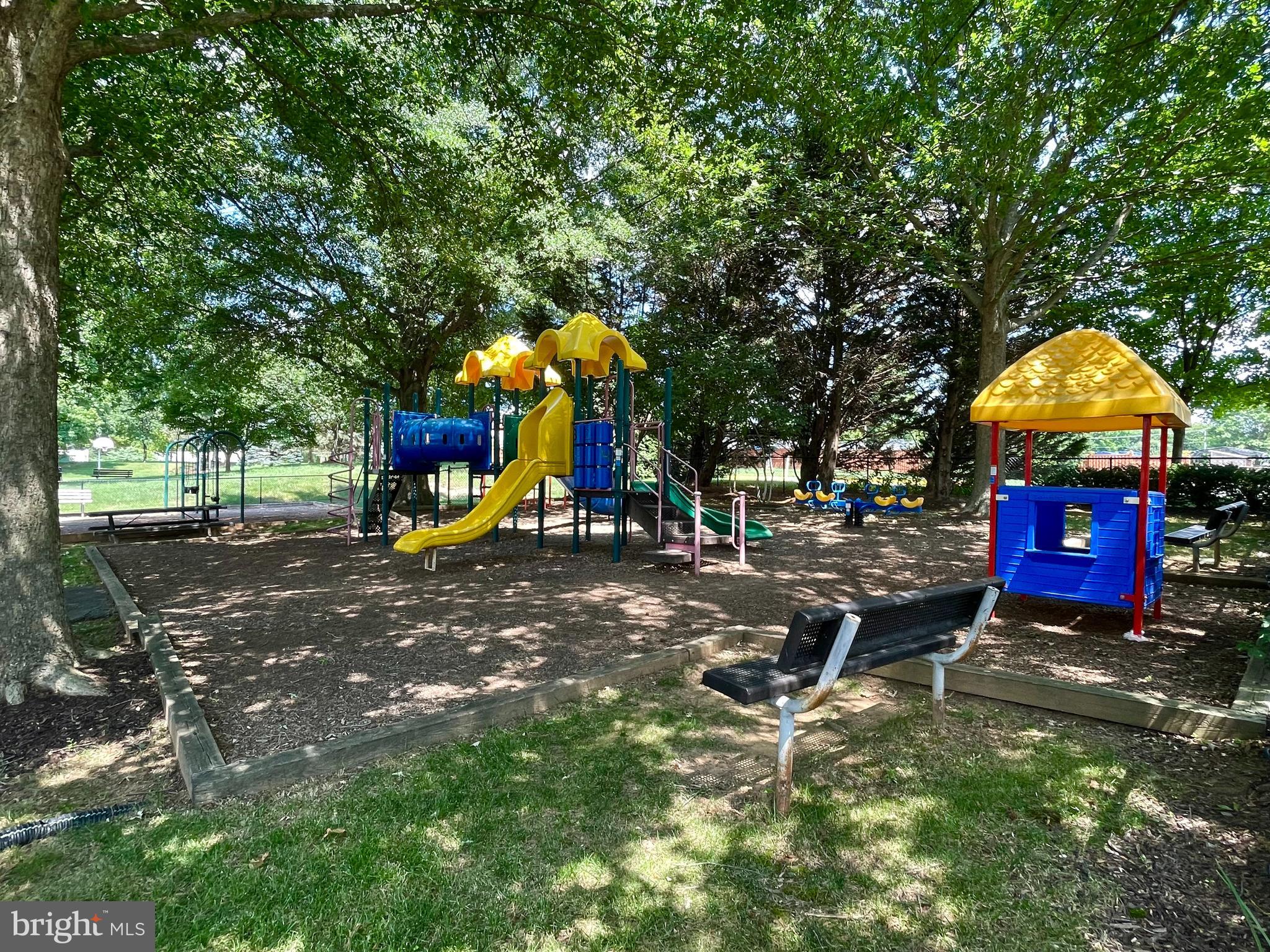 10861 Hunter Gate Way Reston, VA 20194 - Photo 73 of 79 a view of a park with swings and slides