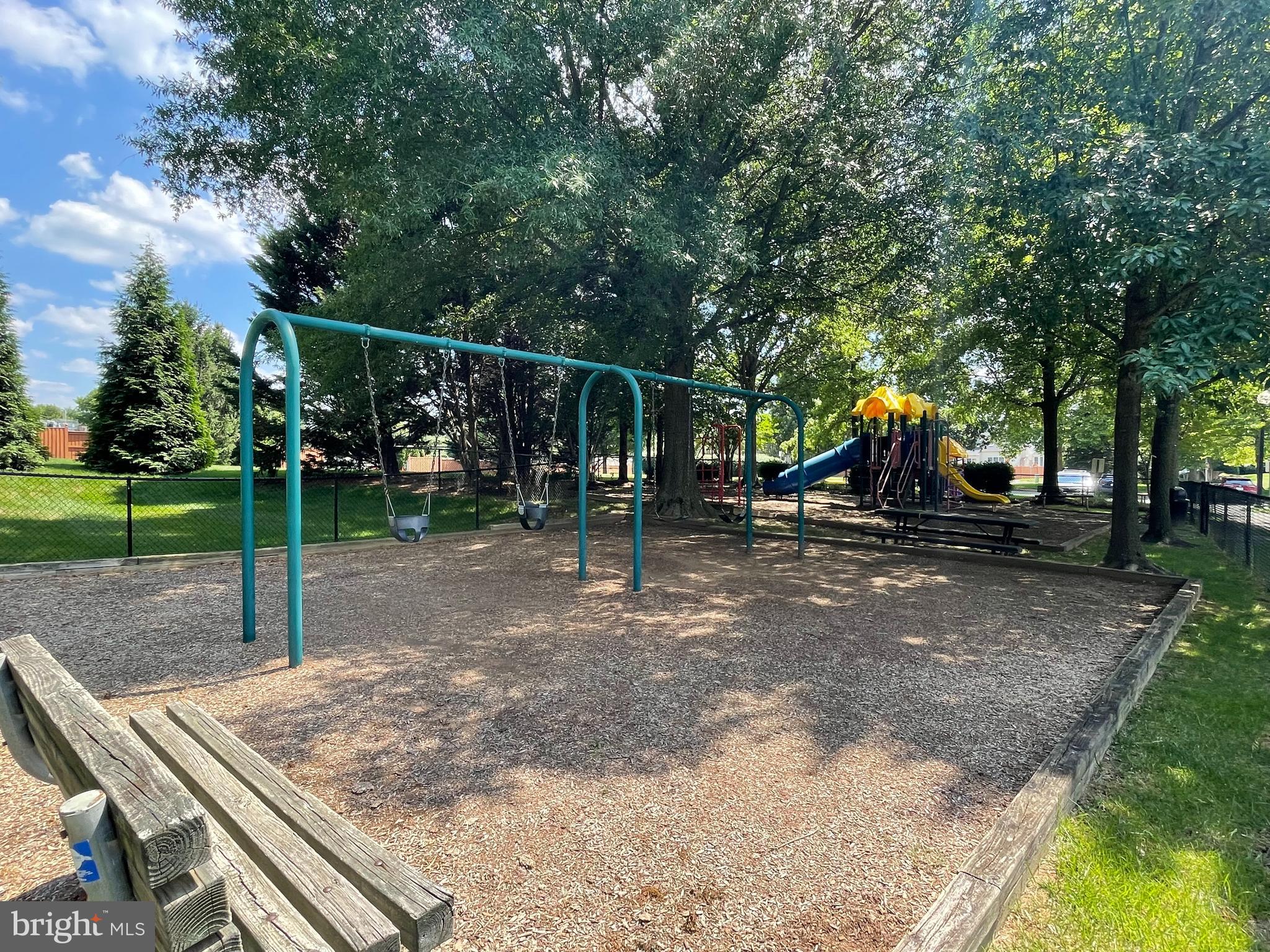 10861 Hunter Gate Way Reston, VA 20194 - Photo 74 of 79 a view of a park with swings