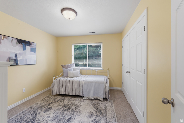 1888 East Cobblestone Road Springville, UT 84663 - Photo 31 of 44 Carpeted room with light yellow walls and white trim
