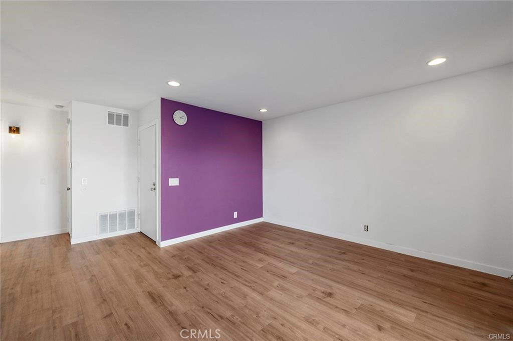 17034 Colima Road, Unit 126 Hacienda Heights, CA 91745 - Photo 12 of 24 a empty room with wooden floor
