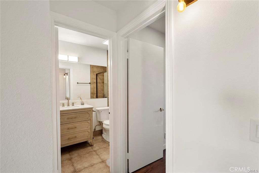 17034 Colima Road, Unit 126 Hacienda Heights, CA 91745 - Photo 13 of 24 a room with a mirror and a sink