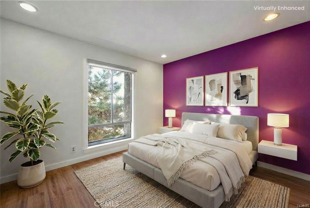 17034 Colima Road, Unit 126 Hacienda Heights, CA 91745 - Photo 16 of 24 a bedroom with a bed and a potted plant