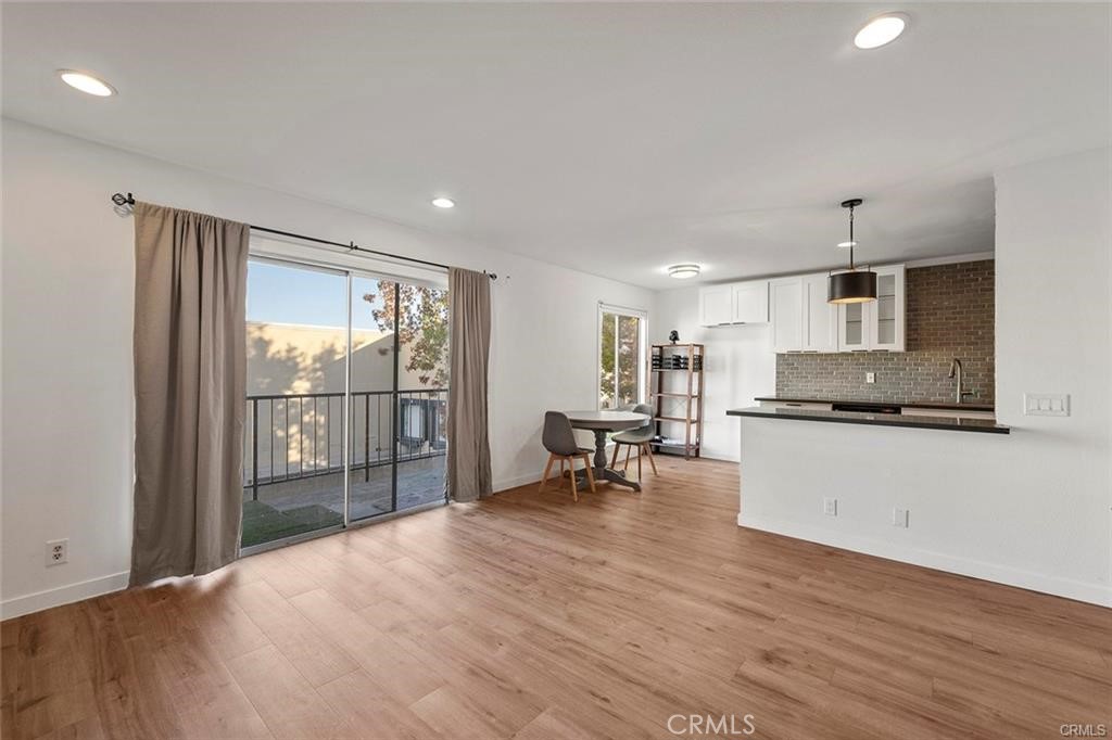 17034 Colima Road, Unit 126 Hacienda Heights, CA 91745 - Photo 4 of 24 a living room with furniture and a wooden floor