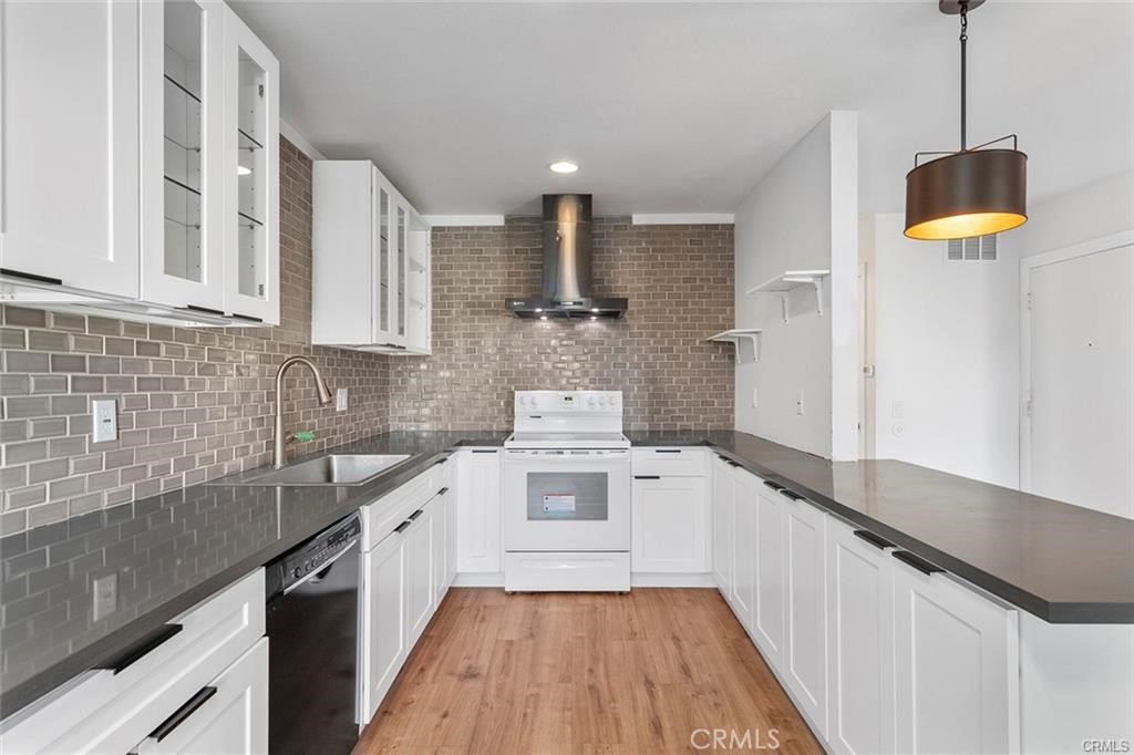 17034 Colima Road, Unit 126 Hacienda Heights, CA 91745 - Photo 5 of 24 a kitchen with a sink and cabinets