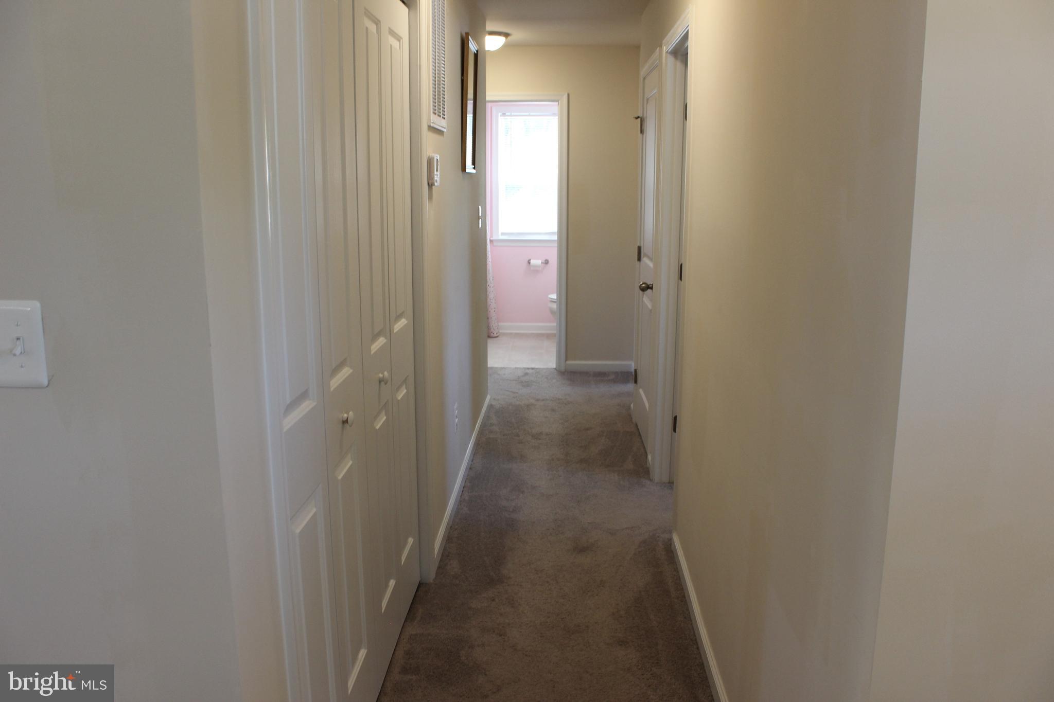 48 Rustic Lane Colonial Beach, VA 22443 - Photo 15 of 29 a view of a livingroom from a hallway