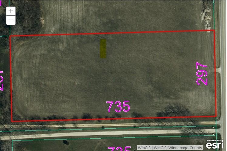 6403 South Perryville Road Cherry Valley, IL 61016 - Photo 1 of 2 a sign that is on the side of the grass