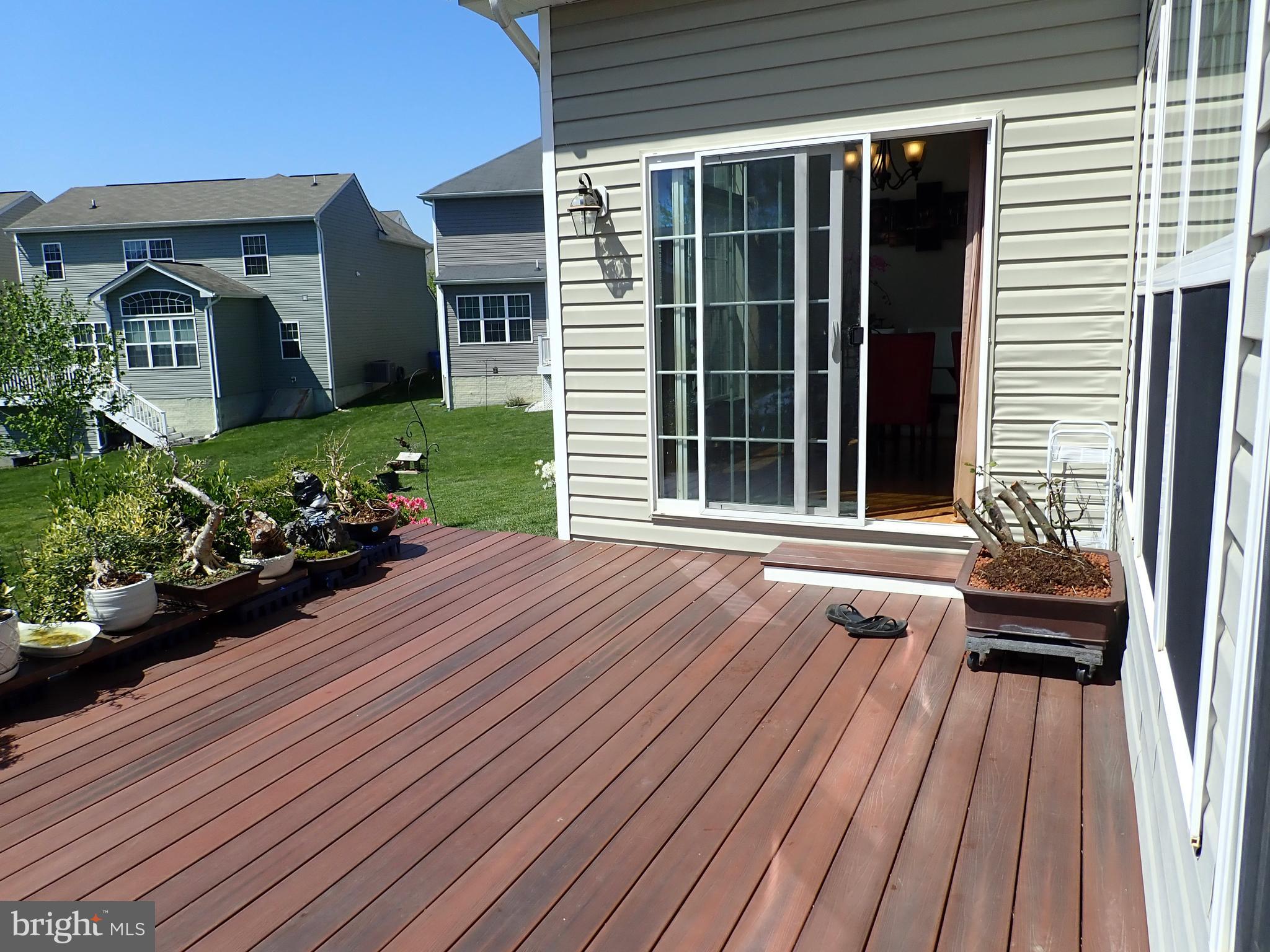 516 Claiborne Road North East, MD 21901 - Photo 12 of 81 Maintenance Free Deck Leads to Kitchen