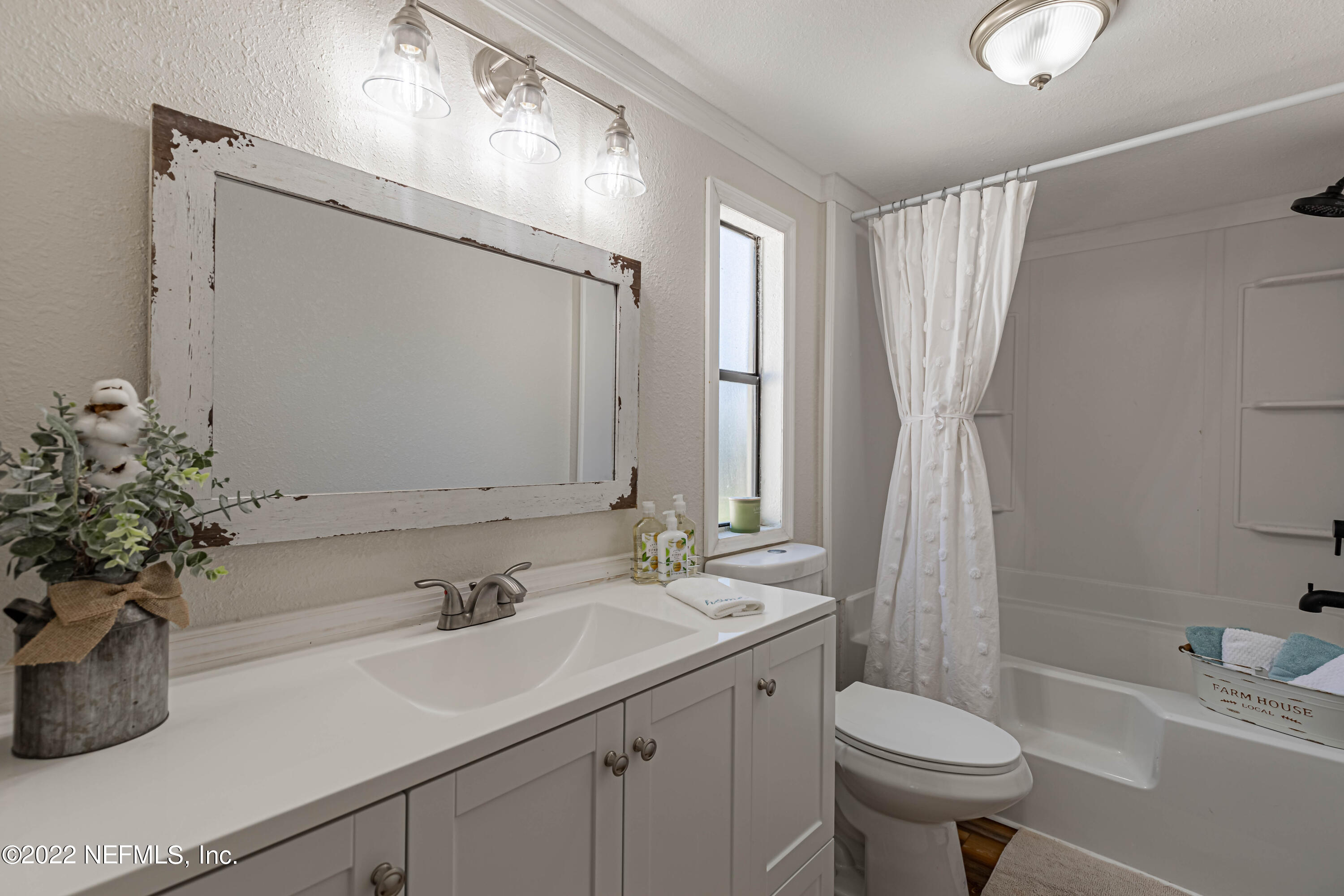 7691 Silver Sands Road Keystone Heights, FL 32656 - Photo 30 of 42 21 Primary Bathroom